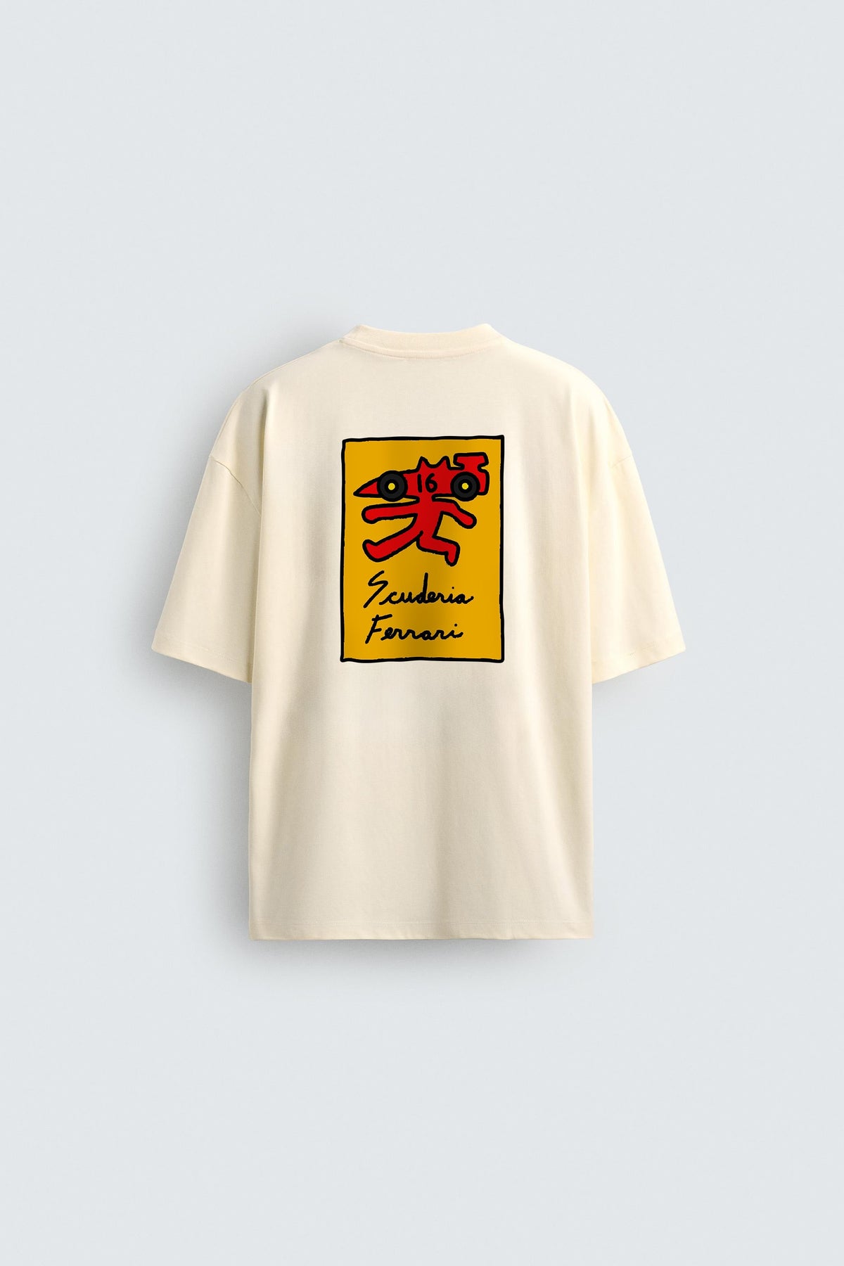 Beige t-shirt with a yellow square graphic and text on a light gray background